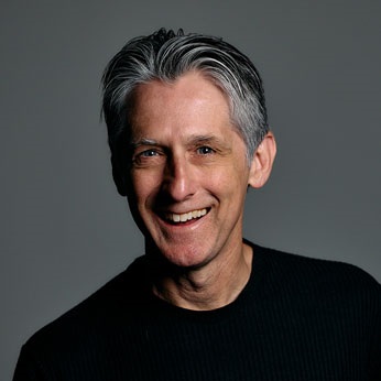 Headshot of Dean Schuster